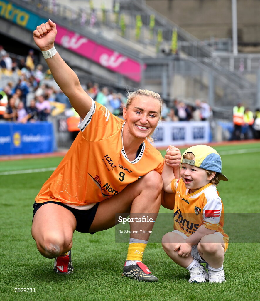 2 August 2026; Áine Tubridy of Antrim and her son Cahir celebrate after their side's victory in the LGFA TG4 All-Ireland Junior Championship final match between Antrim and Carlow at Croke Park in Dublin. Photo by Shauna Clinton/Sportsfile