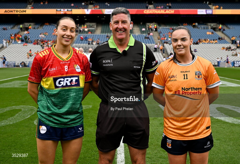 2 August 2026; Referee Conor McCarthy, centre, is joined by Carlow captain Róisín Bailey. left and Antrim captain Bronagh Devlin for the coin toss before the LGFA TG4 All-Ireland Junior Championship final match between Antrim and Carlow at Croke Park in Dublin. Photo by Paul Phelan/Sportsfile