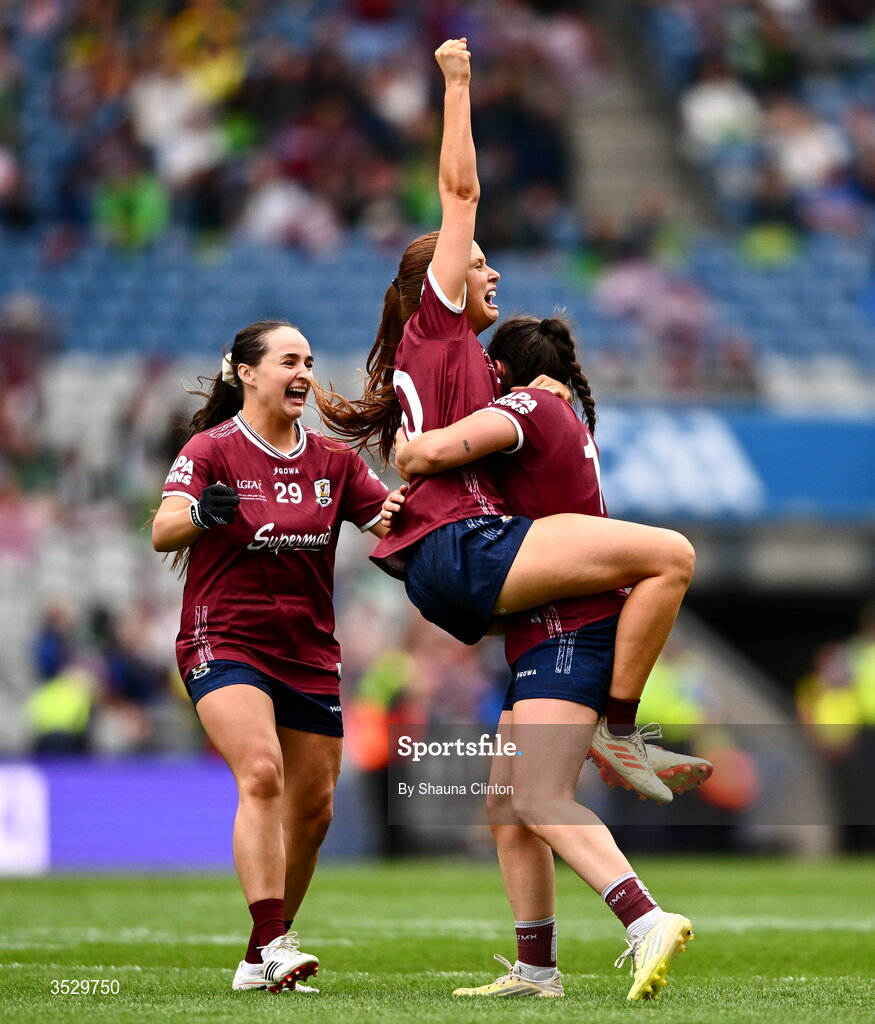 2 August 2026; Galway players, from left, Andrea Trill, Olivia Divilly and Leanne Coen celebrate at the final whistle of the LGFA TG4 All-Ireland Senior Championship final match between Galway and Kerry at Croke Park in Dublin. Photo by Shauna Clinton/Sportsfile