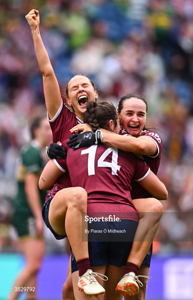 2 August 2026; Galway players Olivia Divilly, Leanne Coen, 14, and Andrea Trill, right, celebrate after the LGFA TG4 All-Ireland Senior Championship final match between Galway and Kerry at Croke Park in Dublin. Photo by Piaras Ó Mídheach/Sportsfile