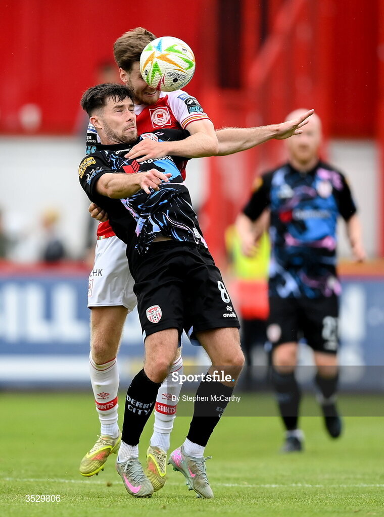 2 August 2026; Adam O'Reilly of Derry City in action against Barry Baggley of St Patrick's Athletic during the SSE Airtricity Men's Premier Division match between St Patrick's Athletic and Derry City at Richmond Park in Dublin. Photo by Stephen McCarthy/Sportsfile