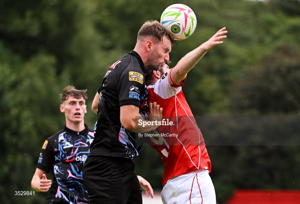 2 August 2026; Jamie Stott of Derry City in action against Aidan Keena of St Patrick's Athletic during the SSE Airtricity Men's Premier Division match between St Patrick's Athletic and Derry City at Richmond Park in Dublin. Photo by Stephen McCarthy/Sportsfile