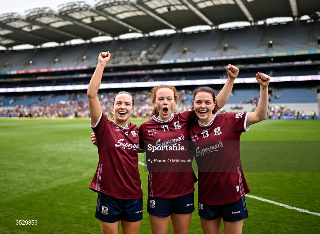 2 August 2026; Galway players, from left, Hannah Noone, Kate Slevin, and Eva Noone celebrate after victory in the LGFA TG4 All-Ireland Senior Championship final match between Galway and Kerry at Croke Park in Dublin. Photo by Piaras Ó Mídheach/Sportsfile