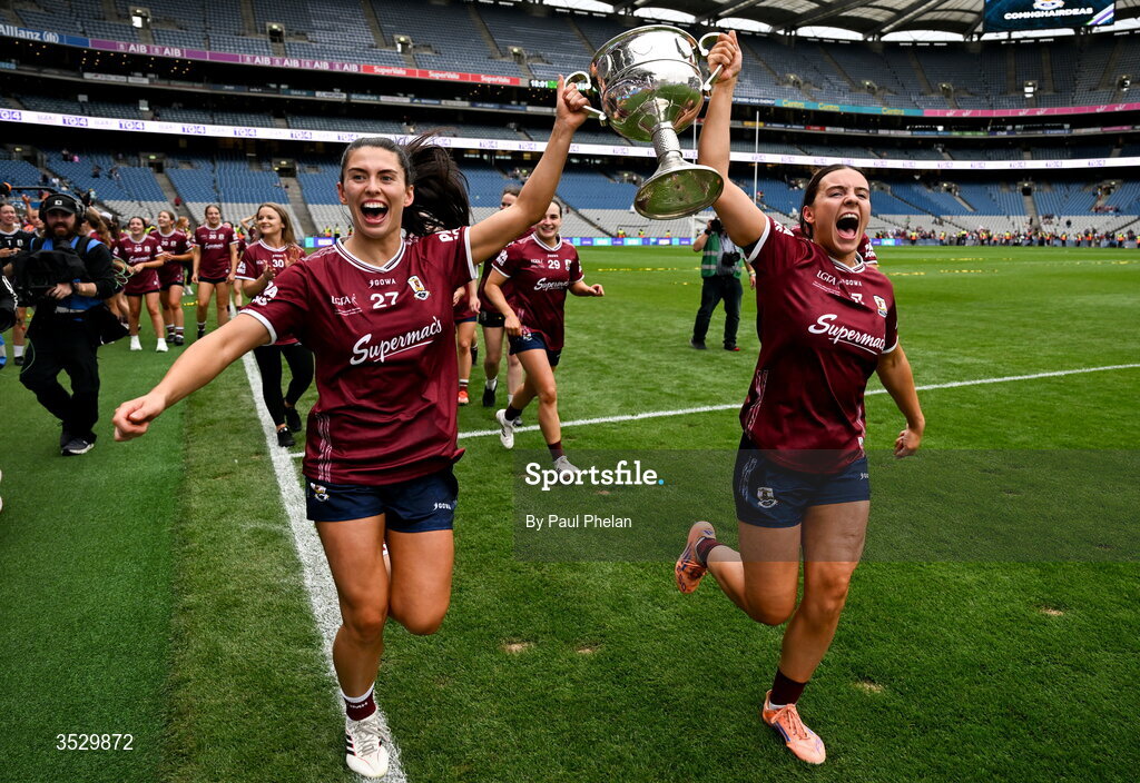 2 August 2026; Ellen Power and Sophie Healy of Galway celebrate with the Brendan Martin cup after winning the LGFA TG4 All-Ireland Senior Championship final match between Galway and Kerry at Croke Park in Dublin. Photo by Paul Phelan/Sportsfile