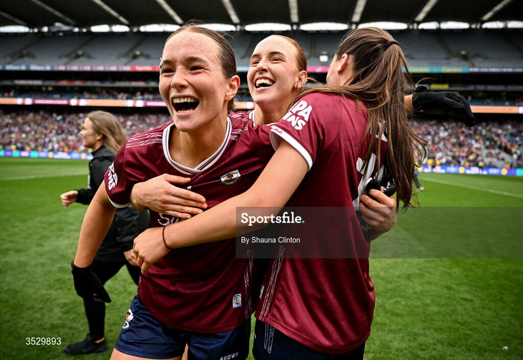 2 August 2026; Galway players, from left, Niamh Divilly, Siobhán Divilly and Aisling Madden celebrate after the LGFA TG4 All-Ireland Senior Championship final match between Galway and Kerry at Croke Park in Dublin. Photo by Shauna Clinton/Sportsfile