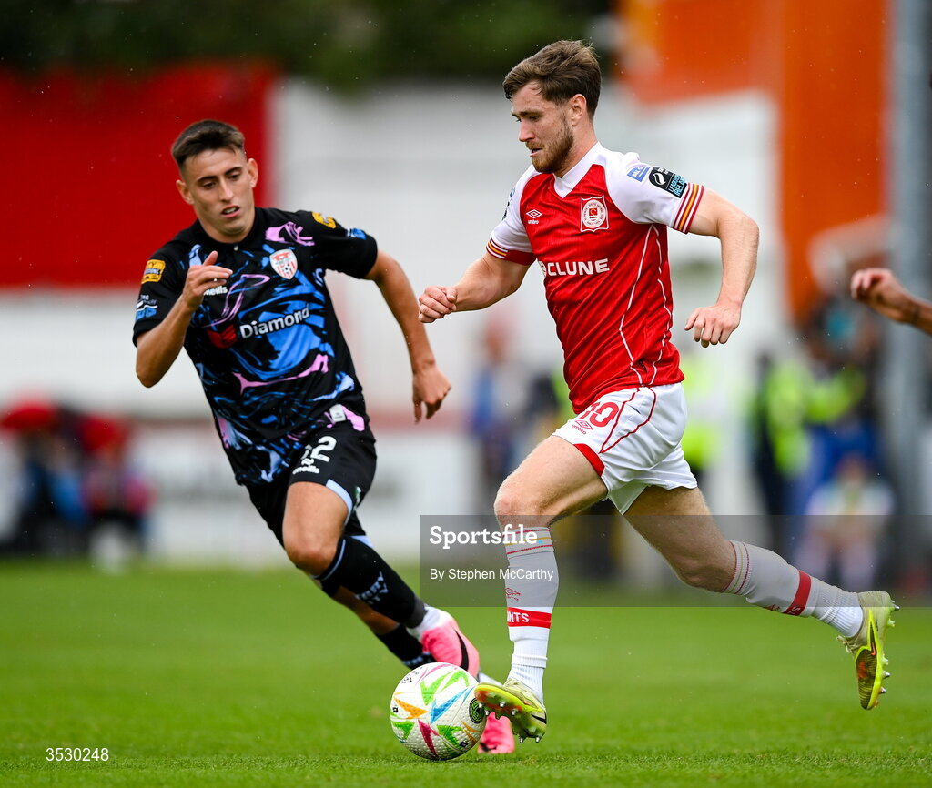 2 August 2026; Barry Baggley of St Patrick's Athletic in action against Darragh Burns of Derry City during the SSE Airtricity Men's Premier Division match between St Patrick's Athletic and Derry City at Richmond Park in Dublin. Photo by Stephen McCarthy/Sportsfile