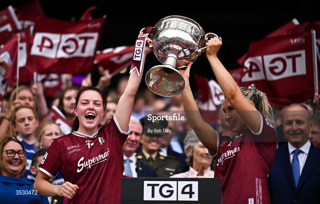2 August 2026; Galway players Eva Noone, left, and Ailish Morrissey lift the Brendan Martin Cup following the LGFA TG4 All-Ireland Senior Championship final match between Galway and Kerry at Croke Park in Dublin. Photo by Seb Daly/Sportsfile