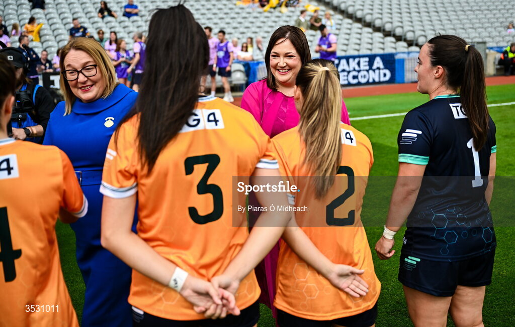 2 August 2026; Trina Murray, LGFA President and Deirdre Ní Choistín, CEO TG4, right, meet the Antrim players before the LGFA TG4 All-Ireland Junior Championship final match between Antrim and Carlow at Croke Park in Dublin. Photo by Piaras Ó Mídheach/Sportsfile