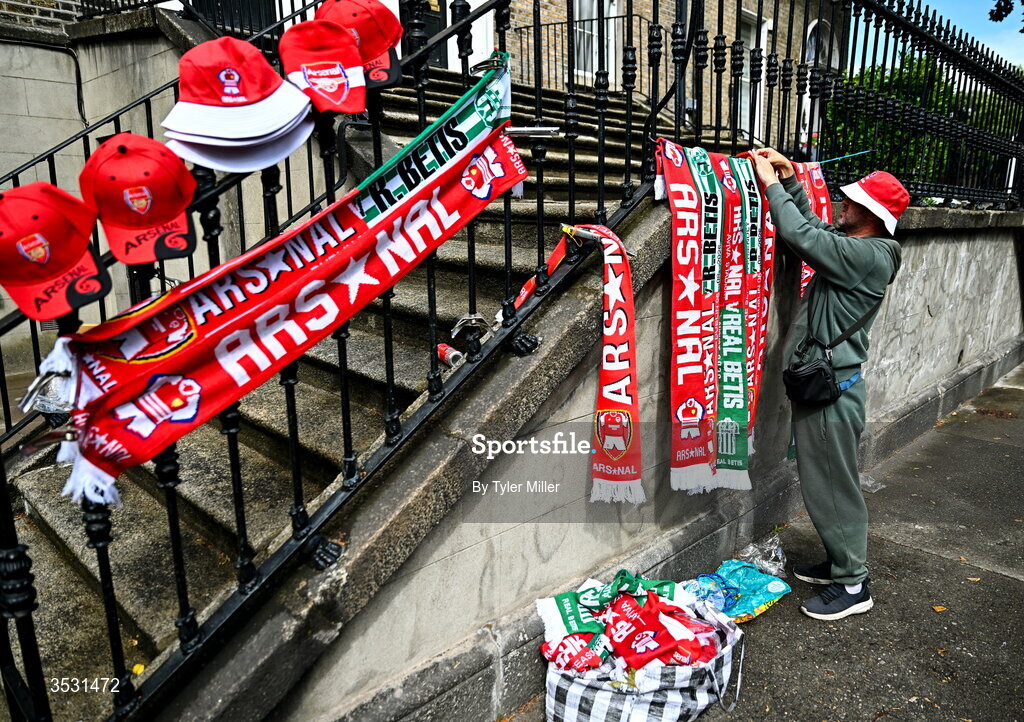 5 August 2026; Merchandise seller Barry Kavanagh outside the ground before the pre-season friendly match between Arsenal and Real Betis at the Aviva Stadium in Dublin. Photo by Tyler Miller/Sportsfile