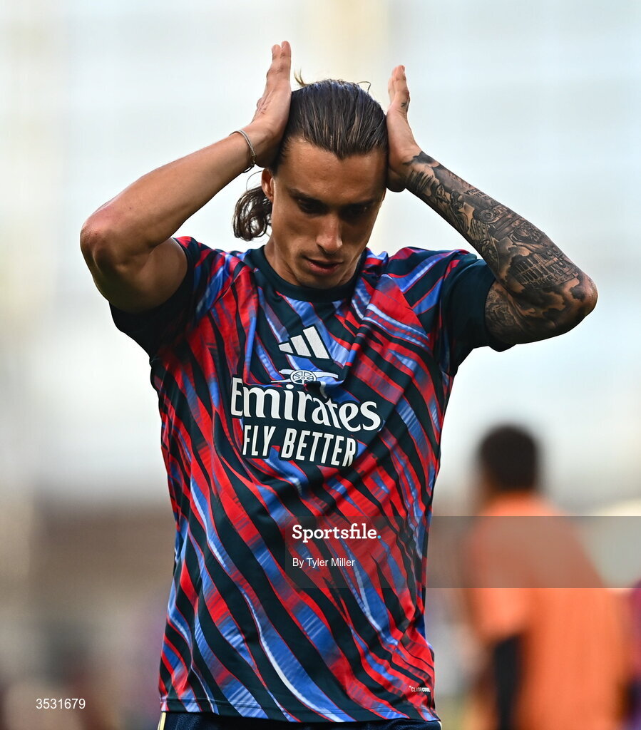 5 August 2026; Riccardo Calafiori of Arsenal warms up before the pre-season friendly match between Arsenal and Real Betis at the Aviva Stadium in Dublin. Photo by Tyler Miller/Sportsfile