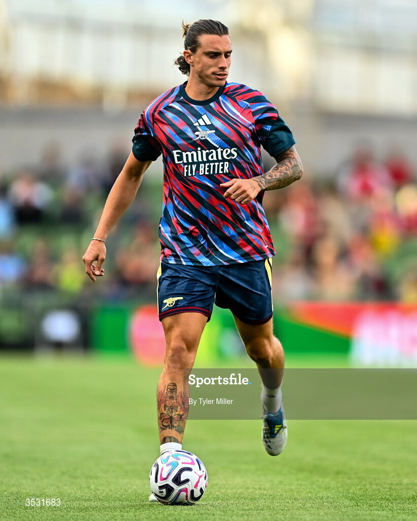 5 August 2026; Riccardo Calafiori of Arsenal warms up before the pre-season friendly match between Arsenal and Real Betis at the Aviva Stadium in Dublin. Photo by Tyler Miller/Sportsfile