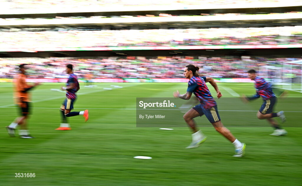 5 August 2026; Riccardo Calafiori of Arsenal warms up before the pre-season friendly match between Arsenal and Real Betis at the Aviva Stadium in Dublin. Photo by Tyler Miller/Sportsfile