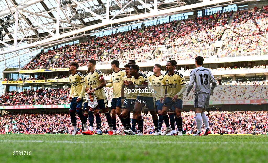 5 August 2026; Arsenal players break from the team photo during the pre-season friendly match between Arsenal and Real Betis at the Aviva Stadium in Dublin. Photo by Tyler Miller/Sportsfile