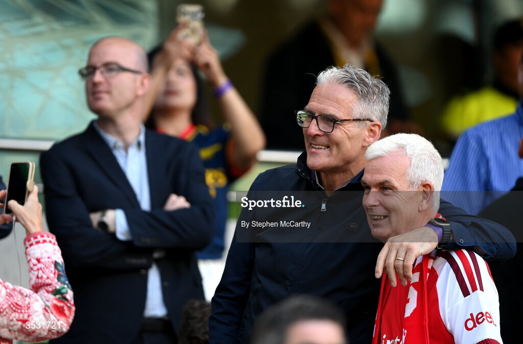 5 August 2026; Uachtarán Chumann Lúthchleas Gael Jarlath Burns poses with a supporter before the pre-season friendly match between Arsenal and Real Betis at the Aviva Stadium in Dublin. Photo by Stephen McCarthy/Sportsfile