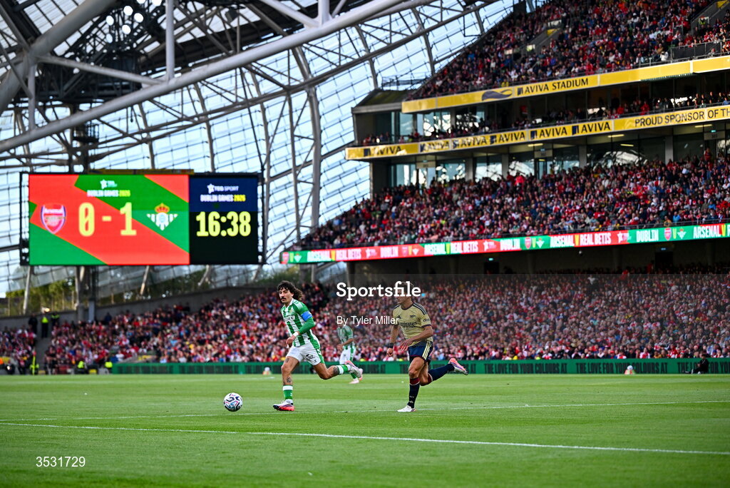 5 August 2026; Christos Tzolis of Arsenal in action against Héctor Bellerín of Real Betis during the pre-season friendly match between Arsenal and Real Betis at the Aviva Stadium in Dublin. Photo by Tyler Miller/Sportsfile