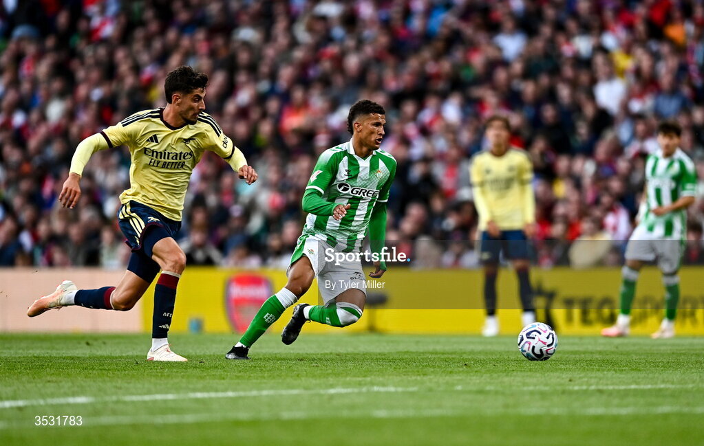 5 August 2026; Nelson Deossa of Real Betis in action against Kai Havertz of Arsenal during the pre-season friendly match between Arsenal and Real Betis at the Aviva Stadium in Dublin. Photo by Tyler Miller/Sportsfile