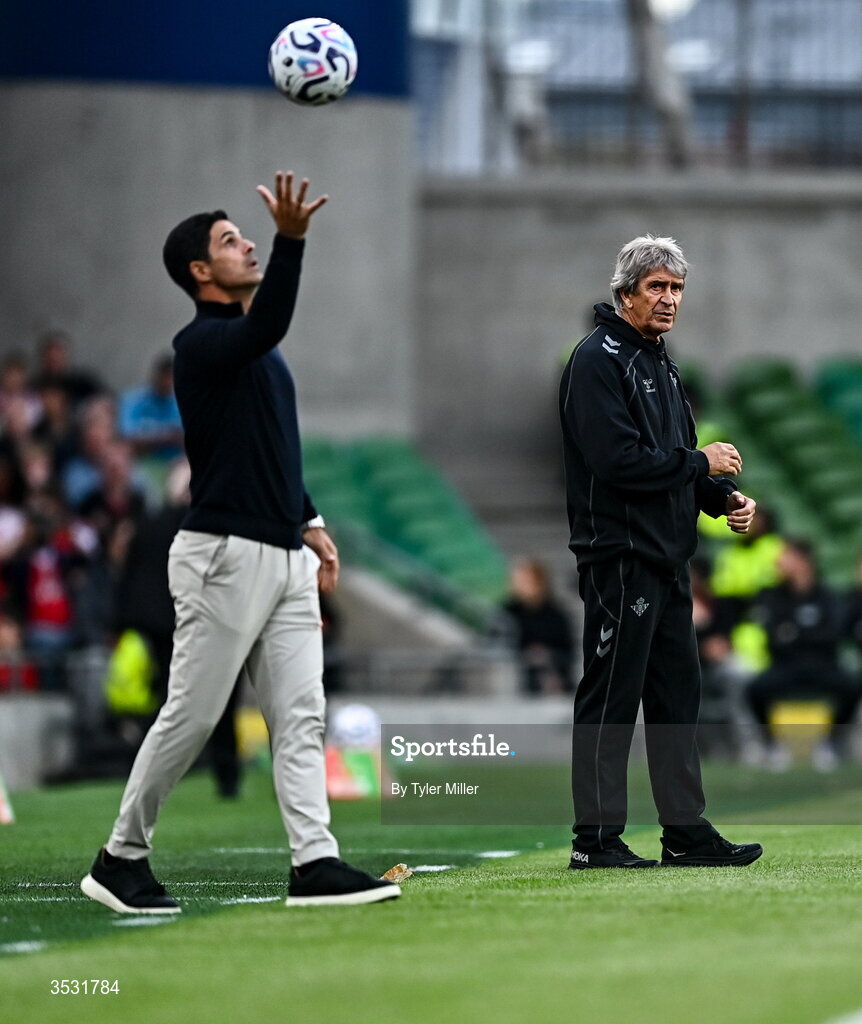 5 August 2026; Real Betis manager Manuel Pellegrini, right and Arsenal manager Mikel Arteta, left during the pre-season friendly match between Arsenal and Real Betis at the Aviva Stadium in Dublin. Photo by Tyler Miller/Sportsfile