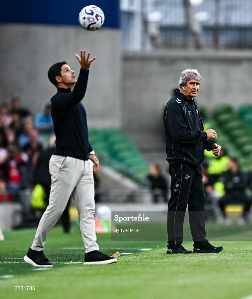 5 August 2026; Real Betis manager Manuel Pellegrini, right, and Arsenal manager Mikel Arteta during the pre-season friendly match between Arsenal and Real Betis at the Aviva Stadium in Dublin. Photo by Tyler Miller/Sportsfile