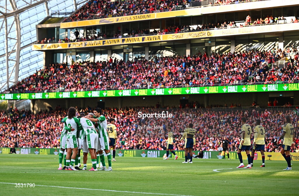 5 August 2026; Nelson Deossa of Real Betis celebrates with teammates after scoring his side's second goal during the pre-season friendly match between Arsenal and Real Betis at the Aviva Stadium in Dublin. Photo by Tyler Miller/Sportsfile
