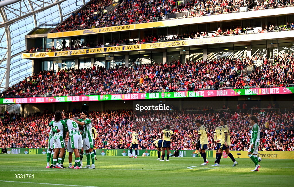 5 August 2026; Nelson Deossa of Real Betis celebrates with teammates after scoring his side's second goal during the pre-season friendly match between Arsenal and Real Betis at the Aviva Stadium in Dublin. Photo by Tyler Miller/Sportsfile