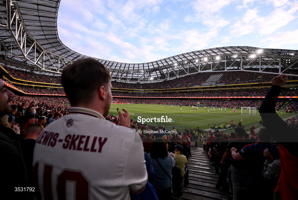 5 August 2026; An Arsenal supporter watches on during the pre-season friendly match between Arsenal and Real Betis at the Aviva Stadium in Dublin. Photo by Stephen McCarthy/Sportsfile