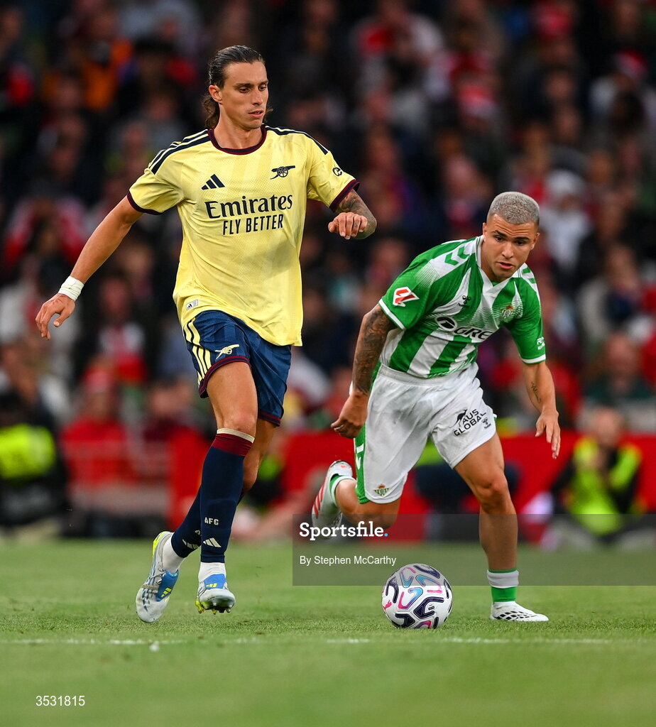 5 August 2026; Riccardo Calafiori of Arsenal in action against Pablo García of Real Betis during the pre-season friendly match between Arsenal and Real Betis at the Aviva Stadium in Dublin. Photo by Stephen McCarthy/Sportsfile