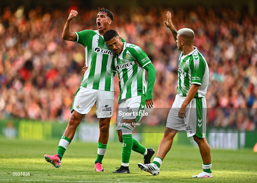 5 August 2026; Nelson Deossa of Real Betis celebrates with Facundo Bernal, left, and Pablo García after scoring his side's second goal  during the pre-season friendly match between Arsenal and Real Betis at the Aviva Stadium in Dublin. Photo by Tyler Miller/Sportsfile