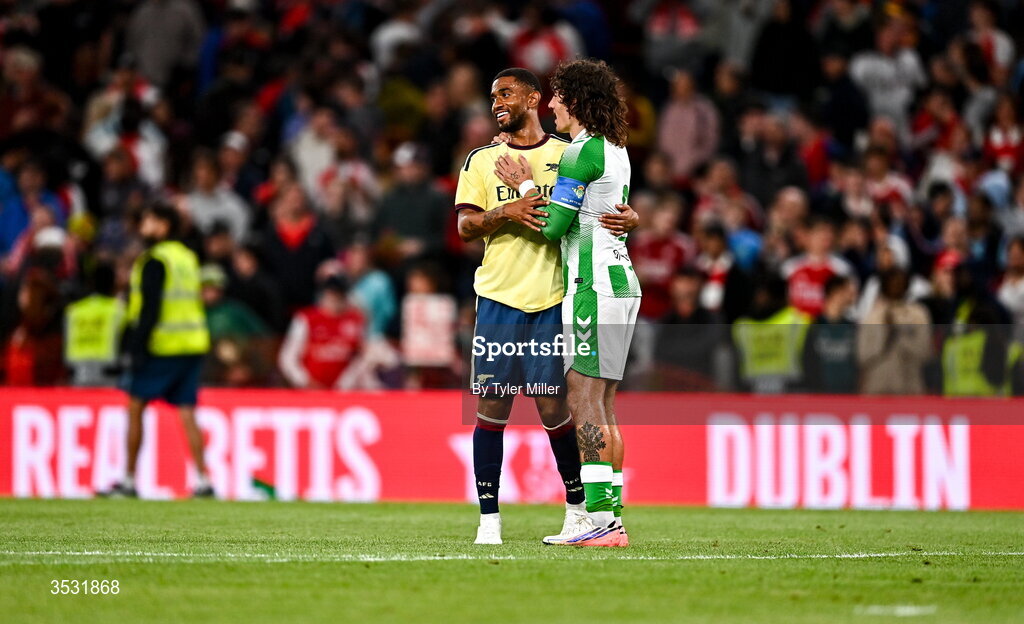 5 August 2026; Reiss Nelson of Arsenal and Héctor Bellerín of Real Betis speak after the pre-season friendly match between Arsenal and Real Betis at the Aviva Stadium in Dublin. Photo by Tyler Miller/Sportsfile