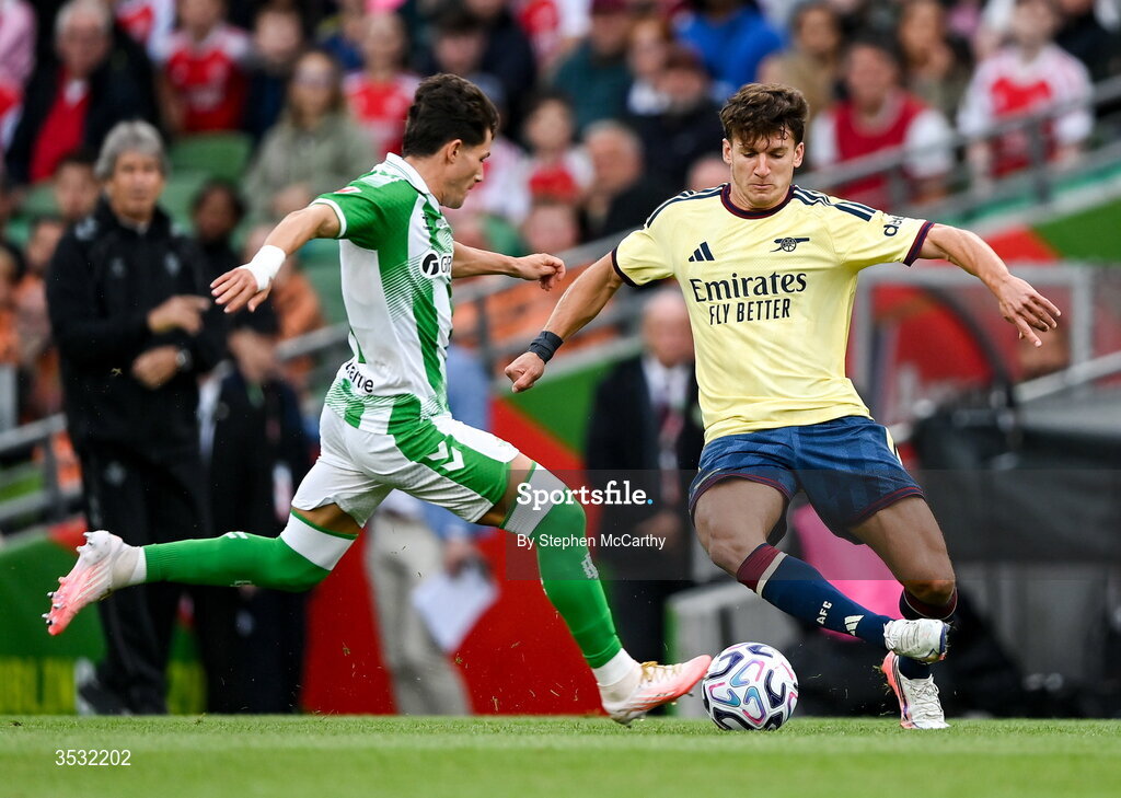 5 August 2026; Christos Tzolis of Arsenal and Fran García of Real Betis during the pre-season friendly match between Arsenal and Real Betis at the Aviva Stadium in Dublin. Photo by Stephen McCarthy/Sportsfile