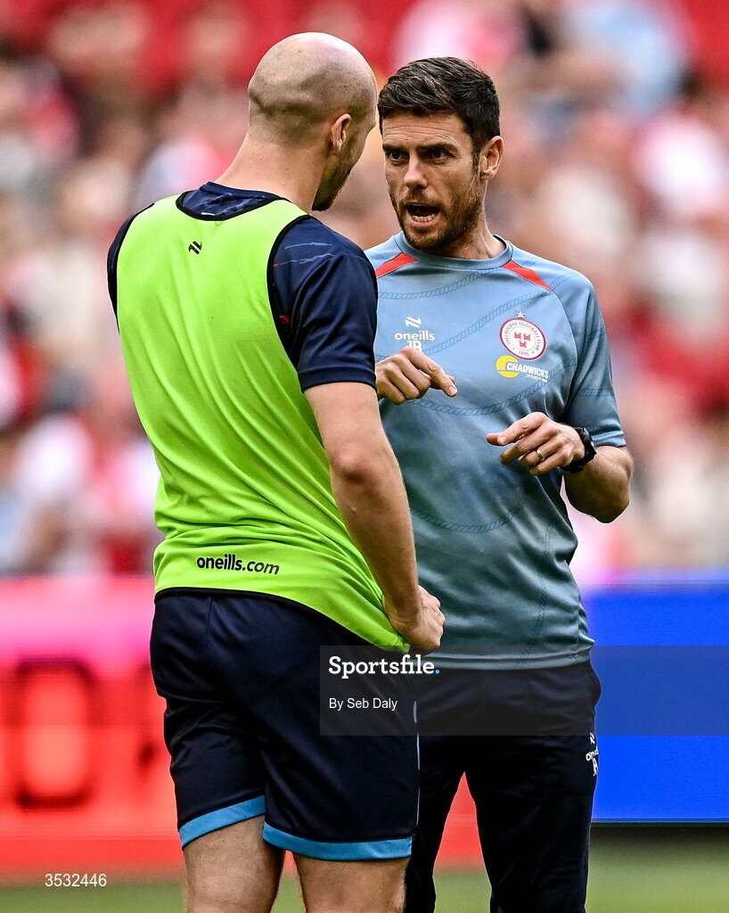 6 August 2026; Shelbourne head coach John Russell spreaks to Kerr McInroy of Shelbourne before the UEFA Conference League Third Qualifying Round first leg match between Ajax and Shelbourne at Johan Cruyff Arena in Amsterdam, Netherlands. Photo by Seb Daly/Sportsfile