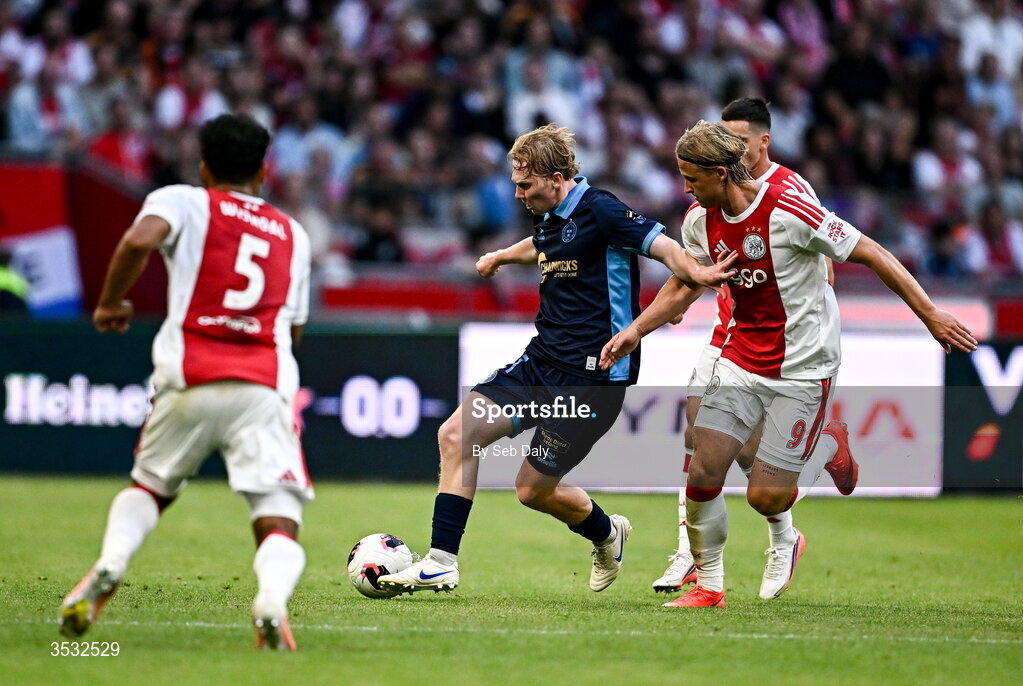 6 August 2026; Jack Henry-Francis of Shelbourne in action against Kasper Dolberg of Ajax during the UEFA Conference League Third Qualifying Round first leg match between Ajax and Shelbourne at Johan Cruyff Arena in Amsterdam, Netherlands. Photo by Seb Daly/Sportsfile