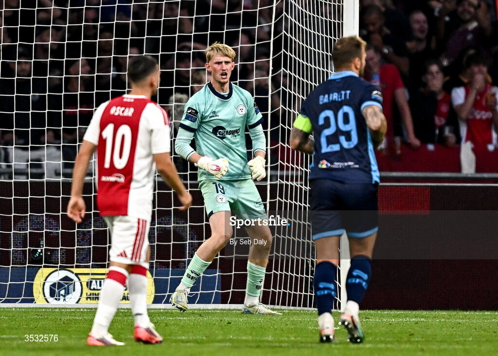 6 August 2026; Shelbourne goalkeeper Eddie Beach celebrates saving a penalty during the UEFA Conference League Third Qualifying Round first leg match between Ajax and Shelbourne at Johan Cruyff Arena in Amsterdam, Netherlands. Photo by Seb Daly/Sportsfile