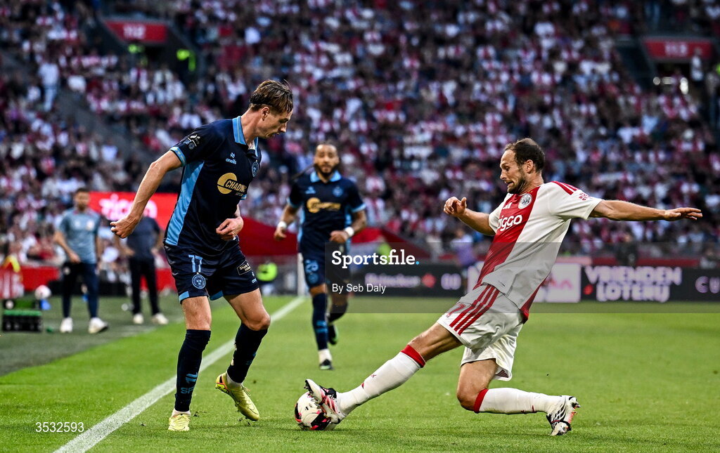 6 August 2026; Daniel Kelly of Shelbourne in action against Daley Blind of Ajax during the UEFA Conference League Third Qualifying Round first leg match between Ajax and Shelbourne at Johan Cruyff Arena in Amsterdam, Netherlands. Photo by Seb Daly/Sportsfile