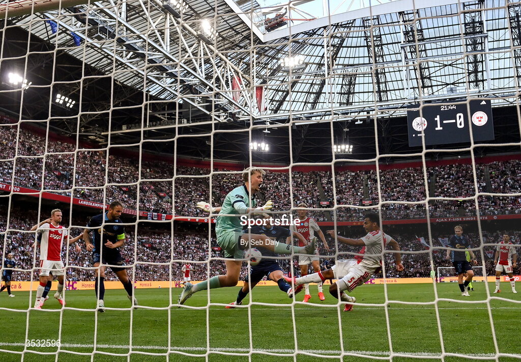 6 August 2026; Owen Wijndal of Ajax shoots to score his side's second goal during the UEFA Conference League Third Qualifying Round first leg match between Ajax and Shelbourne at Johan Cruyff Arena in Amsterdam, Netherlands. Photo by Seb Daly/Sportsfile