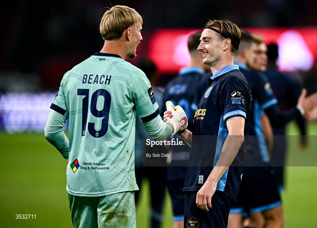 6 August 2026; Shelbourne goalkeeper Eddie Beach and Daniel Kelly of Shelbourne after the UEFA Conference League Third Qualifying Round first leg match between Ajax and Shelbourne at Johan Cruyff Arena in Amsterdam, Netherlands. Photo by Seb Daly/Sportsfile