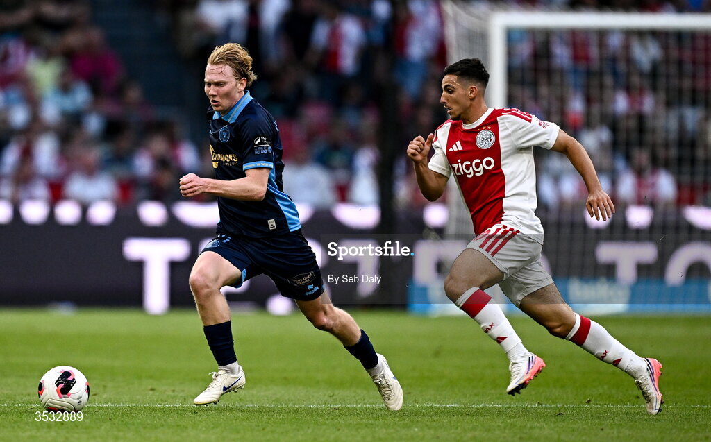 6 August 2026; Jack Henry-Francis of Shelbourne in action against Oscar Gloukh of Ajax during the UEFA Conference League Third Qualifying Round first leg match between Ajax and Shelbourne at Johan Cruyff Arena in Amsterdam, Netherlands. Photo by Seb Daly/Sportsfile