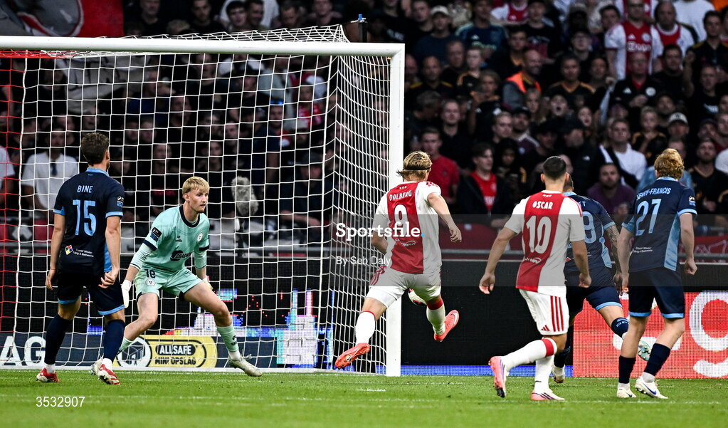 6 August 2026; Kasper Dolberg of Ajax scores his side's third goal, past Shelbourne goalkeeper Eddie Beach, during the UEFA Conference League Third Qualifying Round first leg match between Ajax and Shelbourne at Johan Cruyff Arena in Amsterdam, Netherlands. Photo by Seb Daly/Sportsfile