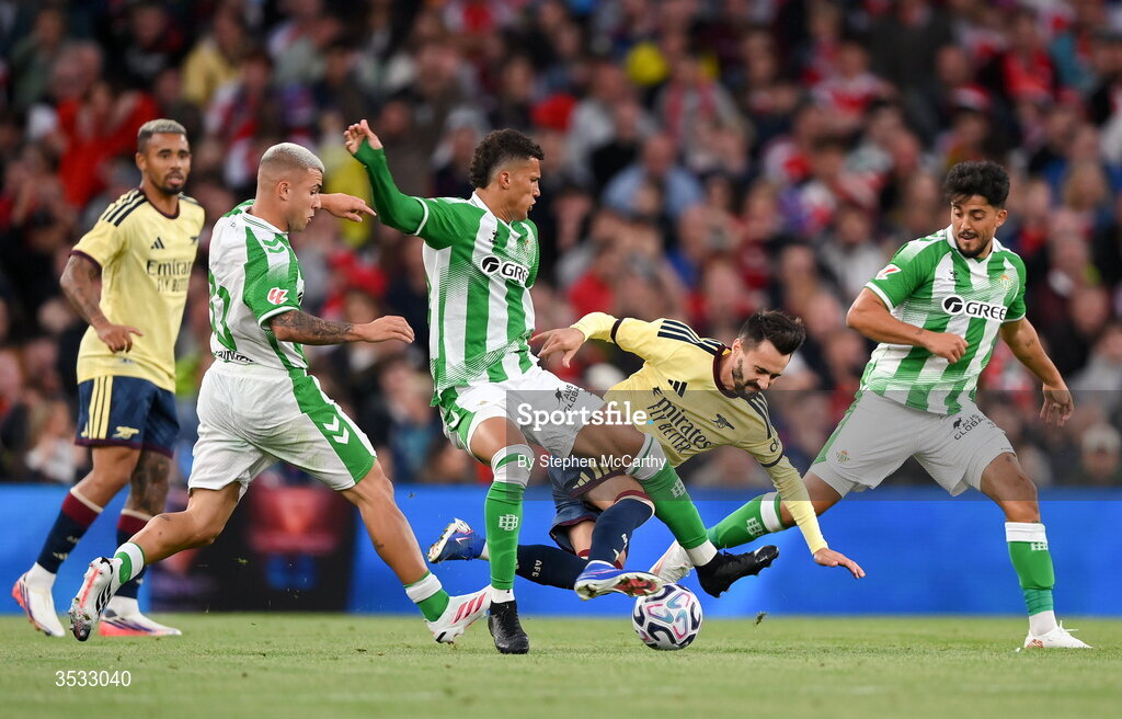 5 August 2026; Fábio Vieira of Arsenal is tackled by Nelson Deossa of Real Betis during the pre-season friendly match between Arsenal and Real Betis at the Aviva Stadium in Dublin. Photo by Stephen McCarthy/Sportsfile