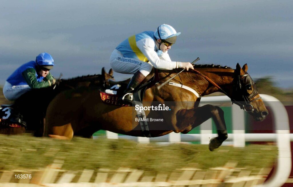 29 December 2004; Hardy Eustace, 2, with Conor O'Dwyer up, jumps the first from the eventual winner Macs Joy, 3, with Barry Geraghty, during the Bewleys Hotels December Festival Hurdle. Leopardstown Racecourse, Dublin. Picture credit; Matt Browne / SPORTSFILE