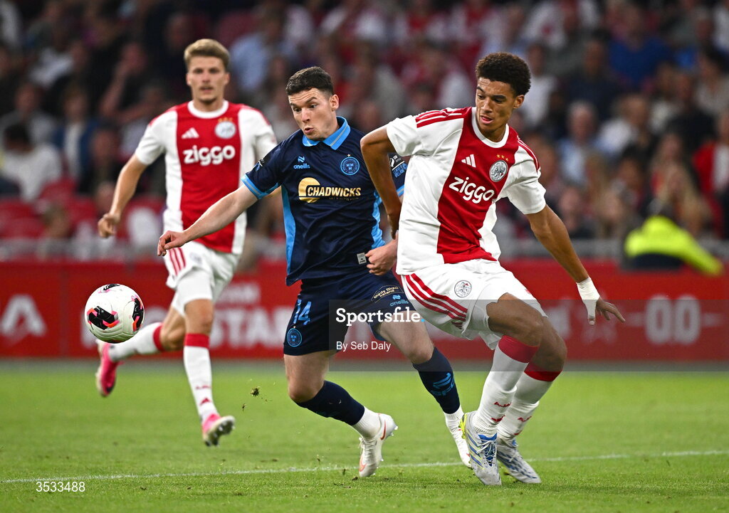 6 August 2026; Ali Coote of Shelbourne in action against Aaron Bouwman of Ajax during the UEFA Conference League Third Qualifying Round first leg match between Ajax and Shelbourne at Johan Cruyff Arena in Amsterdam, Netherlands. Photo by Seb Daly/Sportsfile