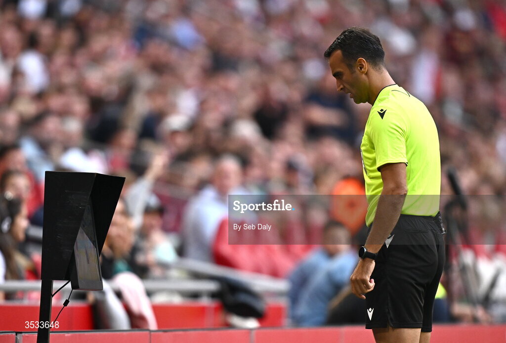 6 August 2026; Referee Atilla Karaoglan consults the VAR monitor during the UEFA Conference League Third Qualifying Round first leg match between Ajax and Shelbourne at Johan Cruyff Arena in Amsterdam, Netherlands. Photo by Seb Daly/Sportsfile