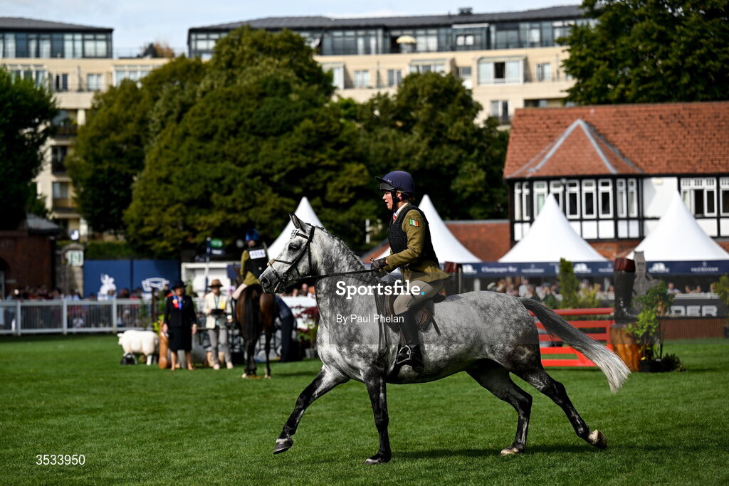 8 August 2026; Holly Logan of Ireland competes on Owens Shadow in the Class 95 Working Hunter Ponies during day four of the Gallagher Dublin Horse Show at the RDS in Dublin. Photo by Paul Phelan/Sportsfile