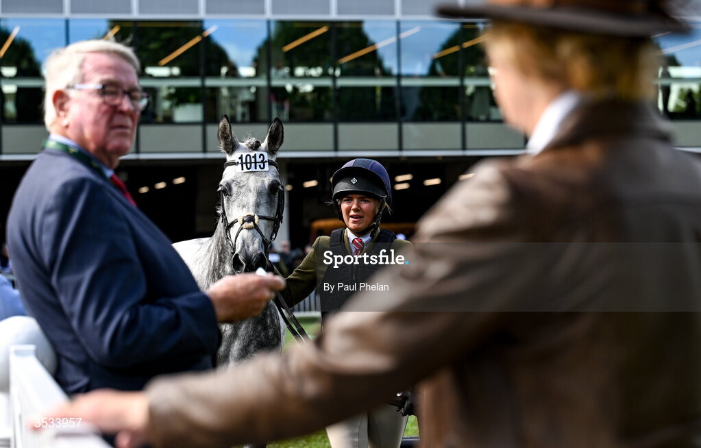 8 August 2026; Holly Logan of Ireland competes on Owens Shadow in the Class 95 Working Hunter Ponies during day four of the Gallagher Dublin Horse Show at the RDS in Dublin. Photo by Paul Phelan/Sportsfile