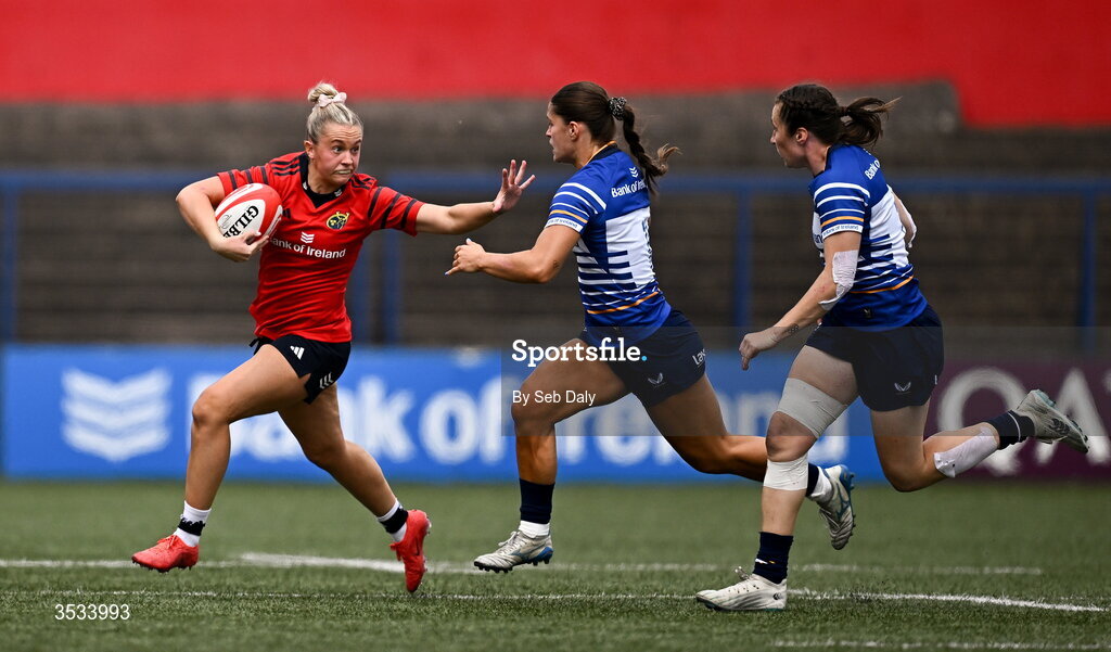 8 August 2026; Lucia Linn of Munster in action against Vicky Elmes of Leinster during the Vodafone Womens Interprovincial Championship Round 1 match between Munster and Leinster at Virgin Media Park in Cork. Photo by Seb Daly/Sportsfile