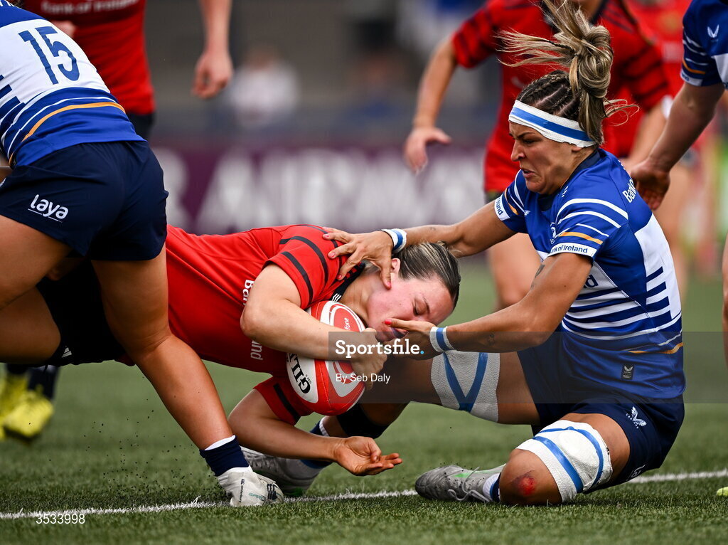 8 August 2026; Alana McInerney of Munster dives over to score her side's second try, despite the tackle of Leinster's Erin King, during the Vodafone Womens Interprovincial Championship Round 1 match between Munster and Leinster at Virgin Media Park in Cork. Photo by Seb Daly/Sportsfile