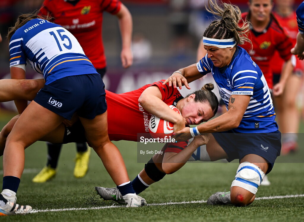8 August 2026; Alana McInerney of Munster dives over to score her side's second try, despite the tackle of Leinster's Erin King, during the Vodafone Womens Interprovincial Championship Round 1 match between Munster and Leinster at Virgin Media Park in Cork. Photo by Seb Daly/Sportsfile