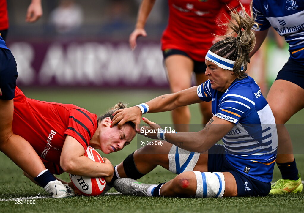 8 August 2026; Alana McInerney of Munster dives over to score her side's second try, despite the tackle of Leinster's Erin King, during the Vodafone Womens Interprovincial Championship Round 1 match between Munster and Leinster at Virgin Media Park in Cork. Photo by Seb Daly/Sportsfile