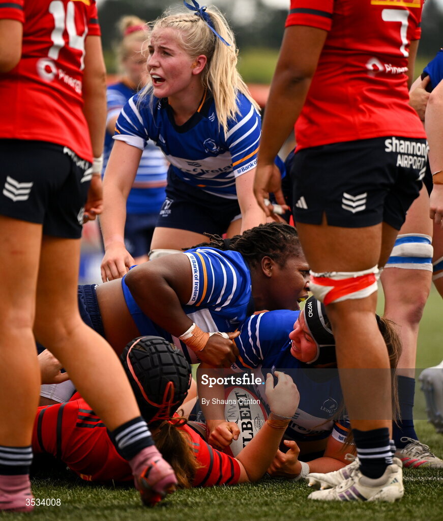 8 August 2026; Sarah Delaney of Leinster, centre, celebrates with team-mates after scoring her side's first try during the Vodafone Womens Interprovincial Championship Round 1 match between Munster and Leinster at Virgin Media Park in Cork. Photo by Shauna Clinton/Sportsfile