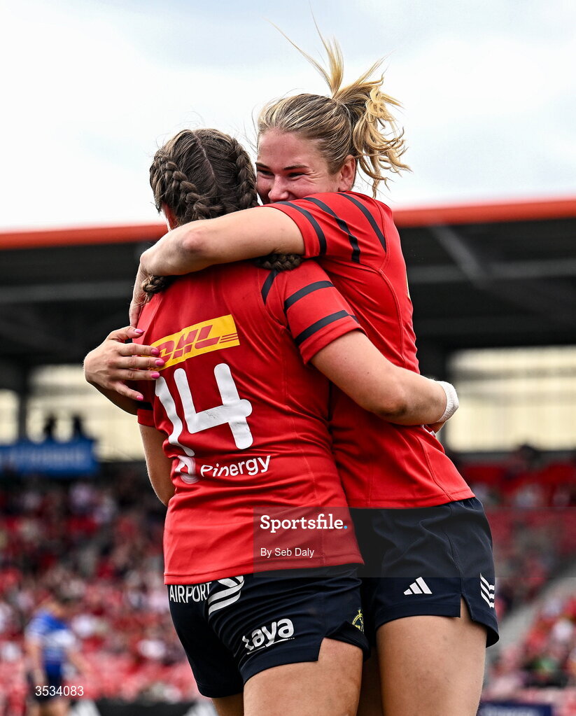 8 August 2026; Katie Corrigan of Munster, left, celebrates with teammate Aoife Corey after scoring their side's sixth try during the Vodafone Womens Interprovincial Championship Round 1 match between Munster and Leinster at Virgin Media Park in Cork. Photo by Seb Daly/Sportsfile