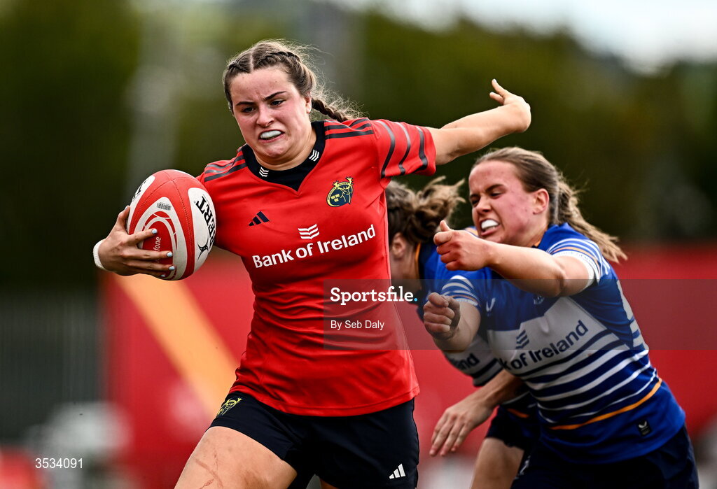 8 August 2026; Katie Corrigan of Munster evades of the challenge of Leinster's Robyn O'Connor on her way to scoring her side's sixth try during the Vodafone Womens Interprovincial Championship Round 1 match between Munster and Leinster at Virgin Media Park in Cork. Photo by Seb Daly/Sportsfile